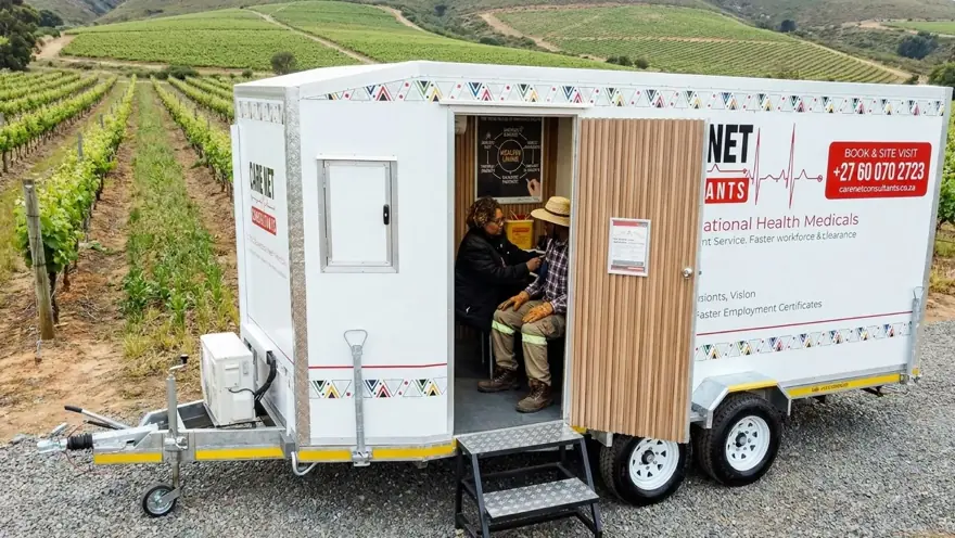 A farm worker has a medical at a Care Net mobile clinic on the farm